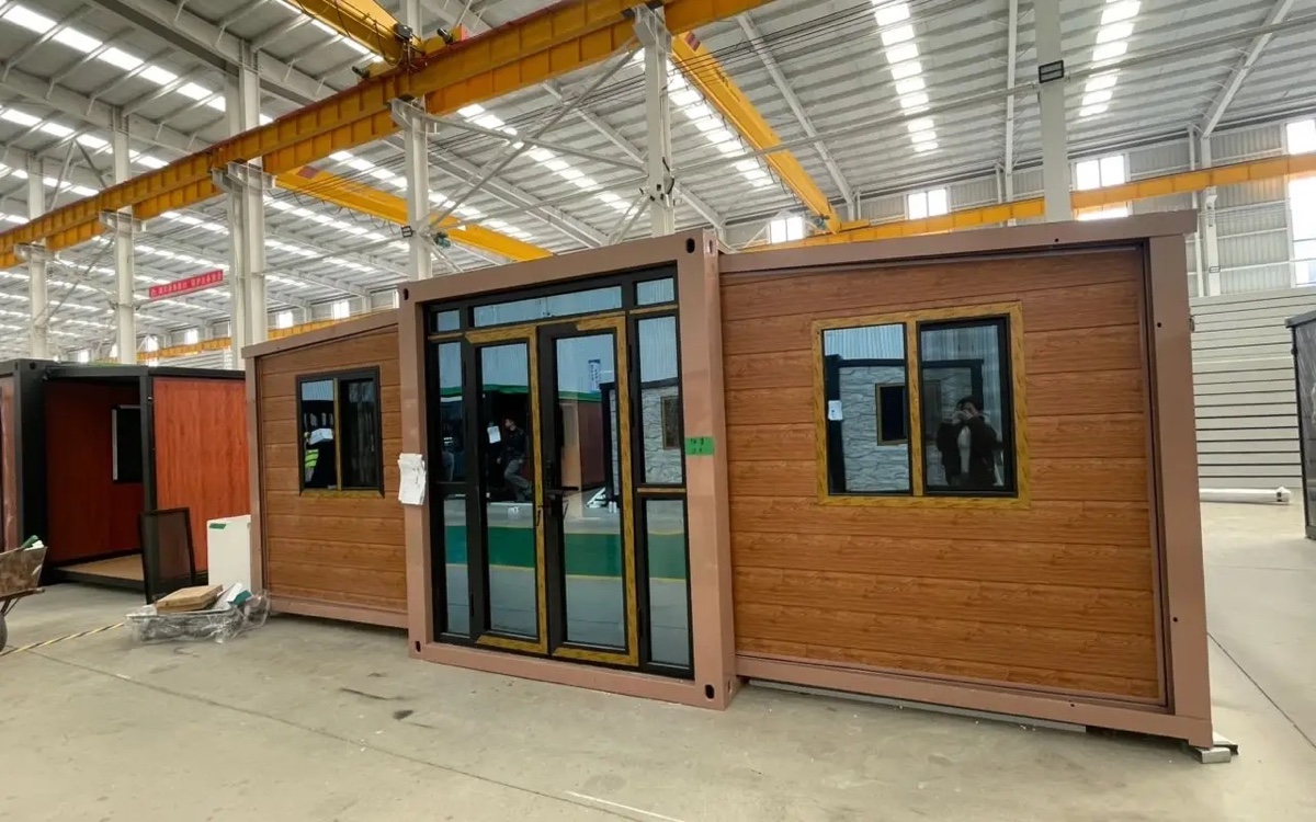 Modular home sections being assembled at a residential building site