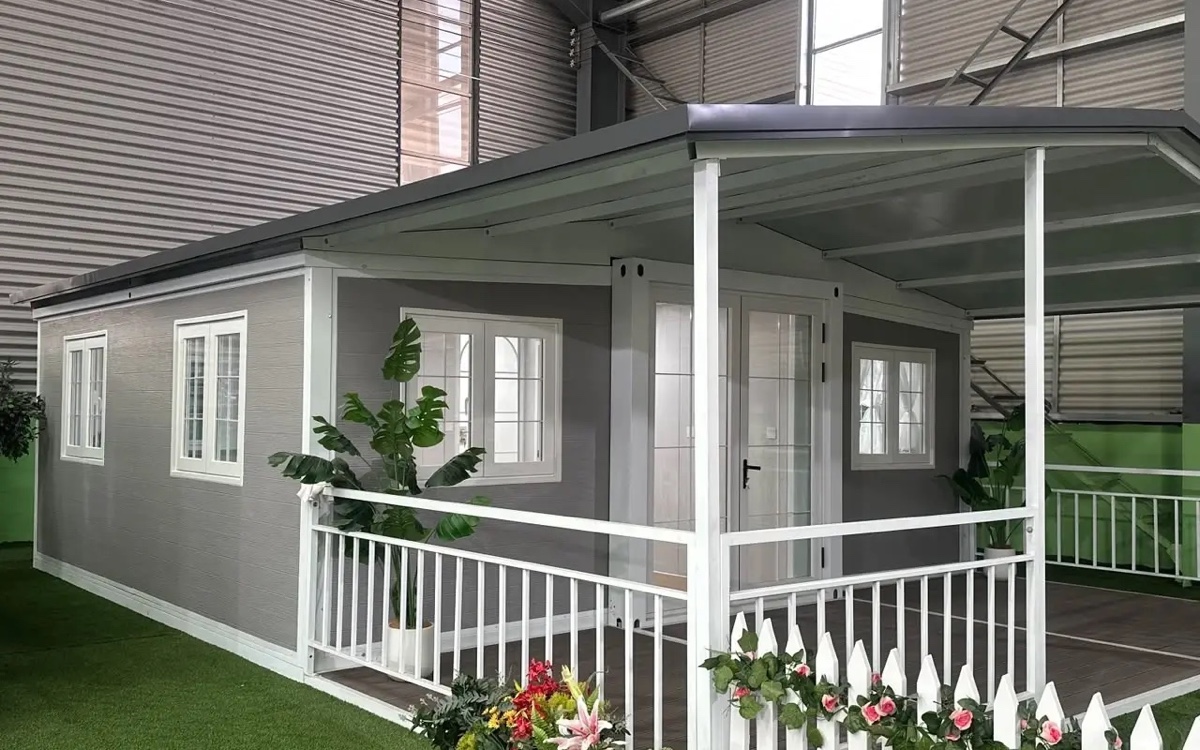 Finished modular home with a wide front porch and multiple rooflines